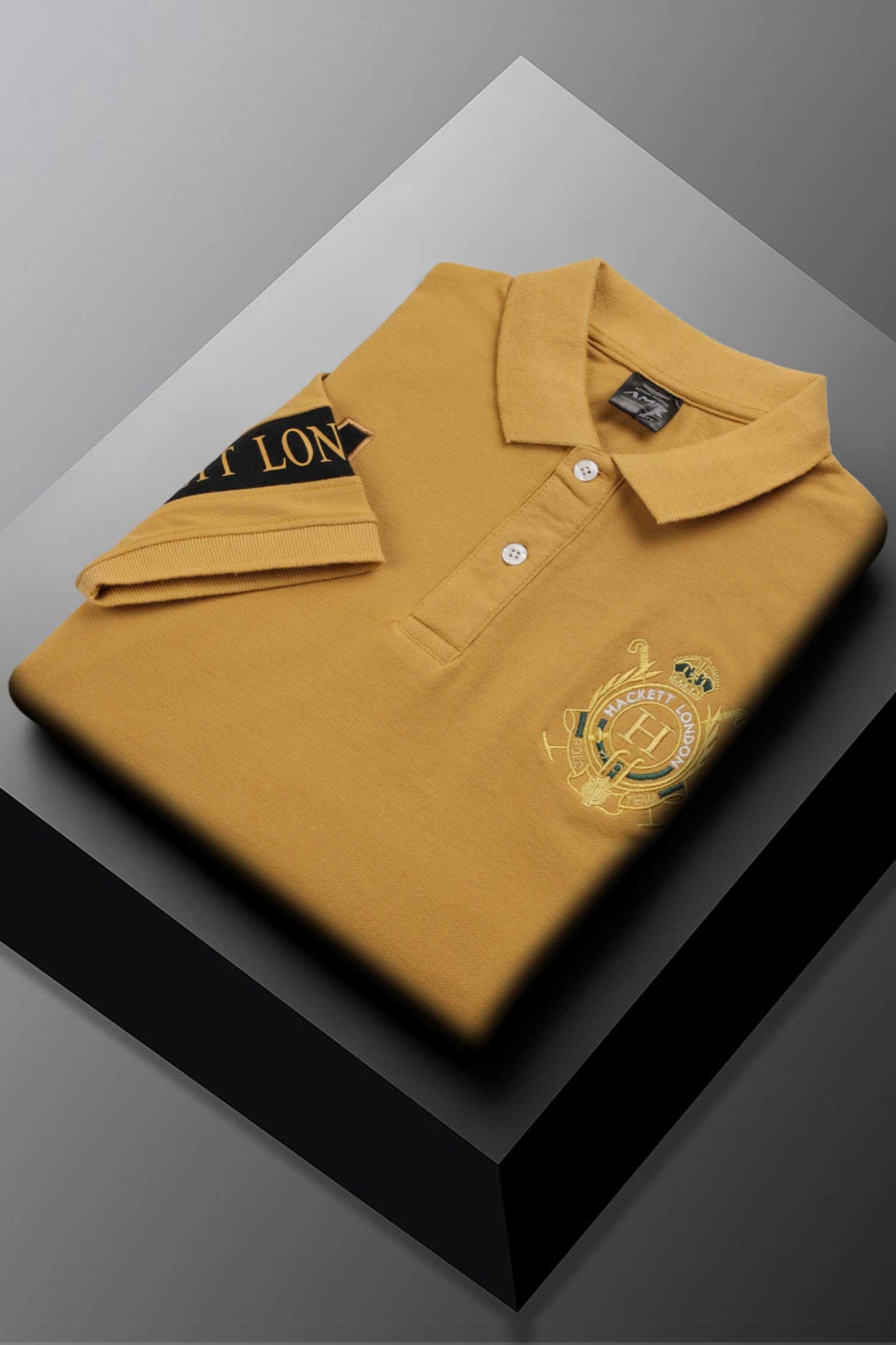 Hackt Lndn Heritage Crown Graphic Men's Polo Shirt In Mustard